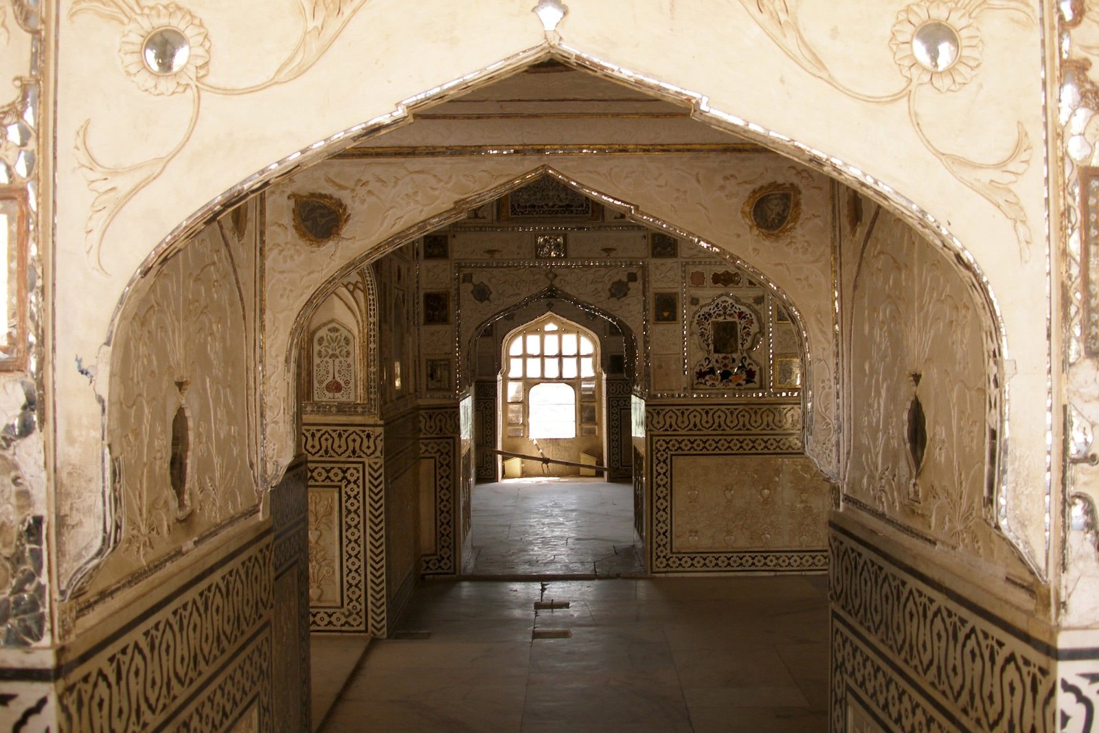 A mirror-worked archway inside Amer Fort, home to 1135 AD