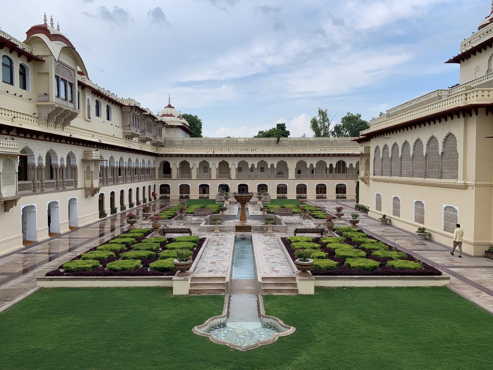 The garden courtyard of Rambagh Palace, where Steam is